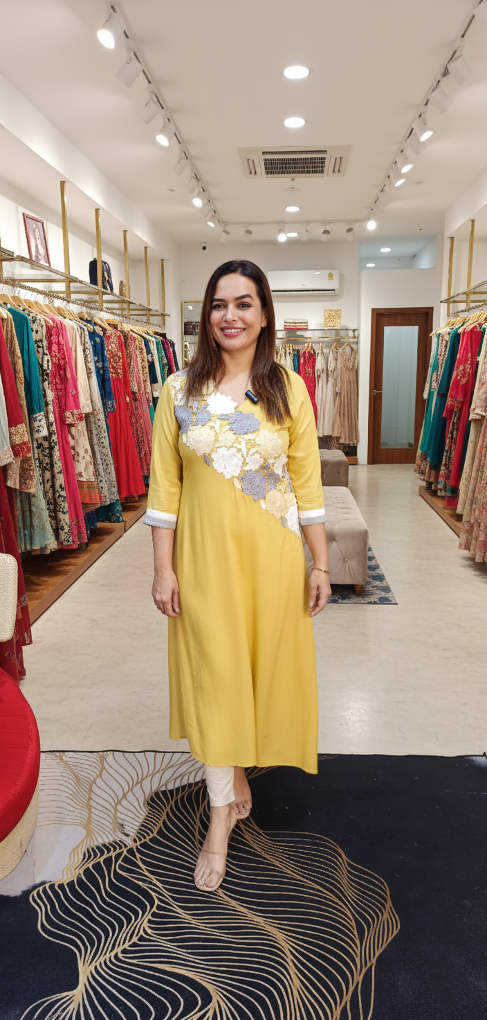 Slanting cut cotton kurti with cutwork lace