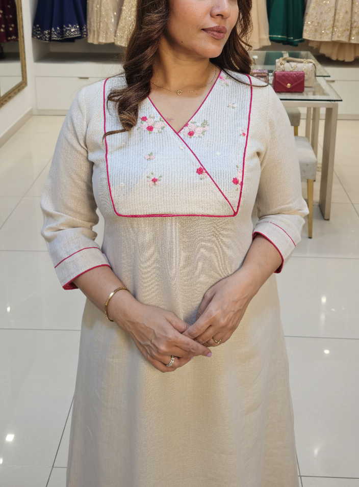 Semi linen kurti with embroidered tissue yolk